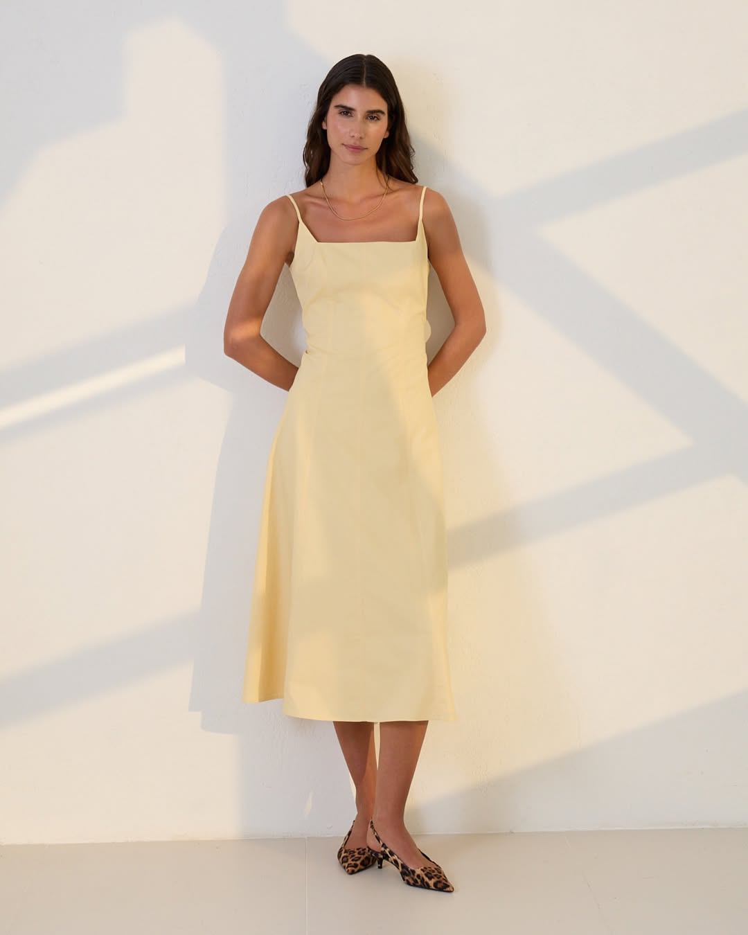 Butter yellow cotton midi dress for women – flared cut with thin straps