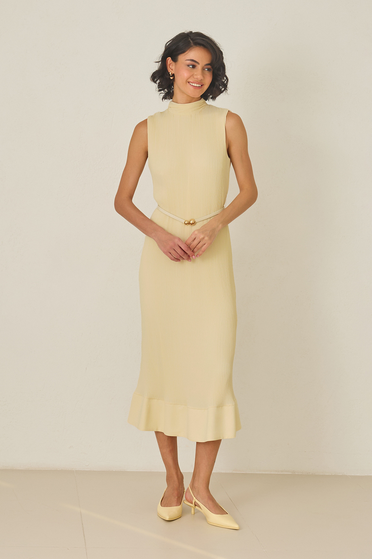 Butter yellow pleated midi dress with high neckline – sleeveless, thin belt, and ruffled hem